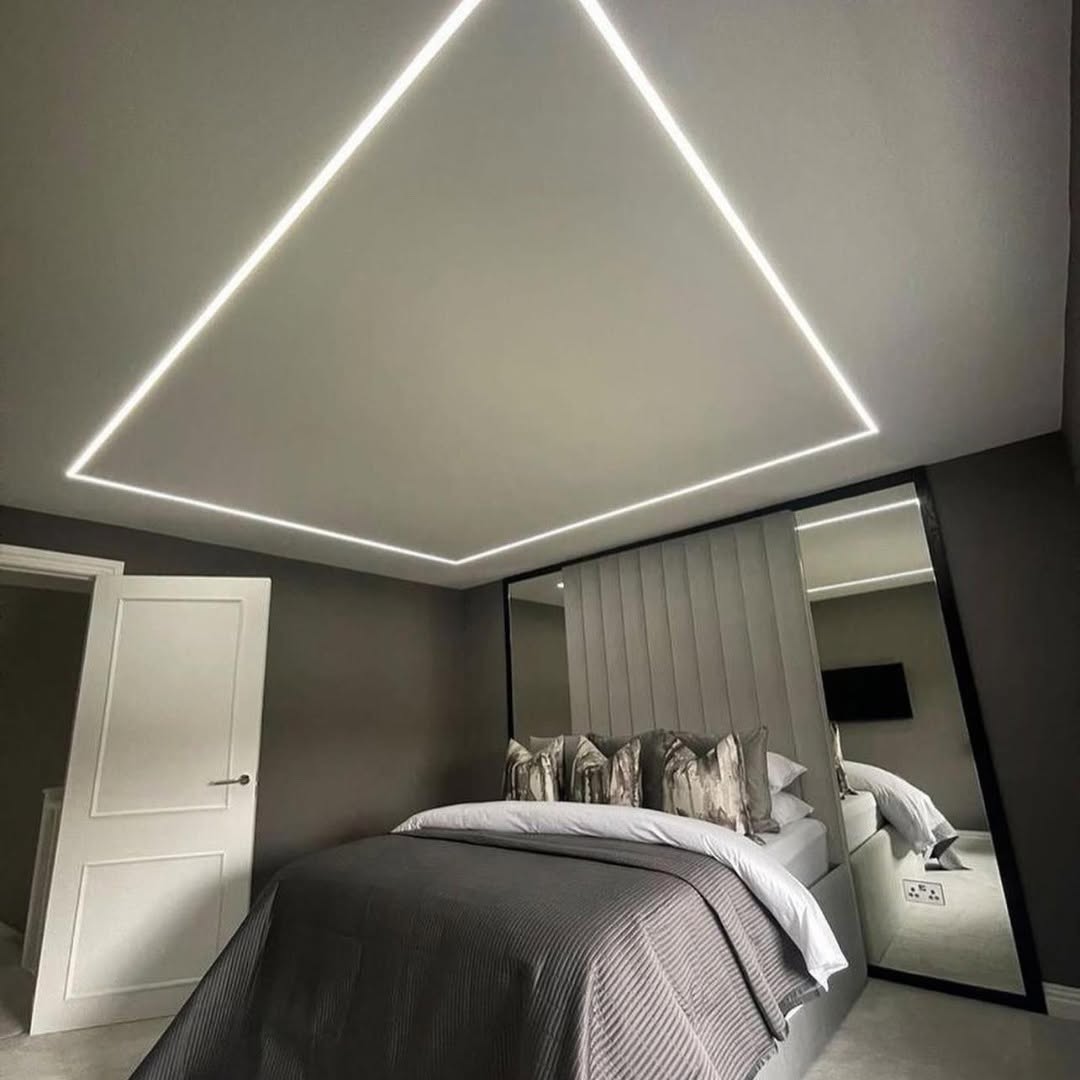 Modern bedroom with a plaster-in LED ceiling detail